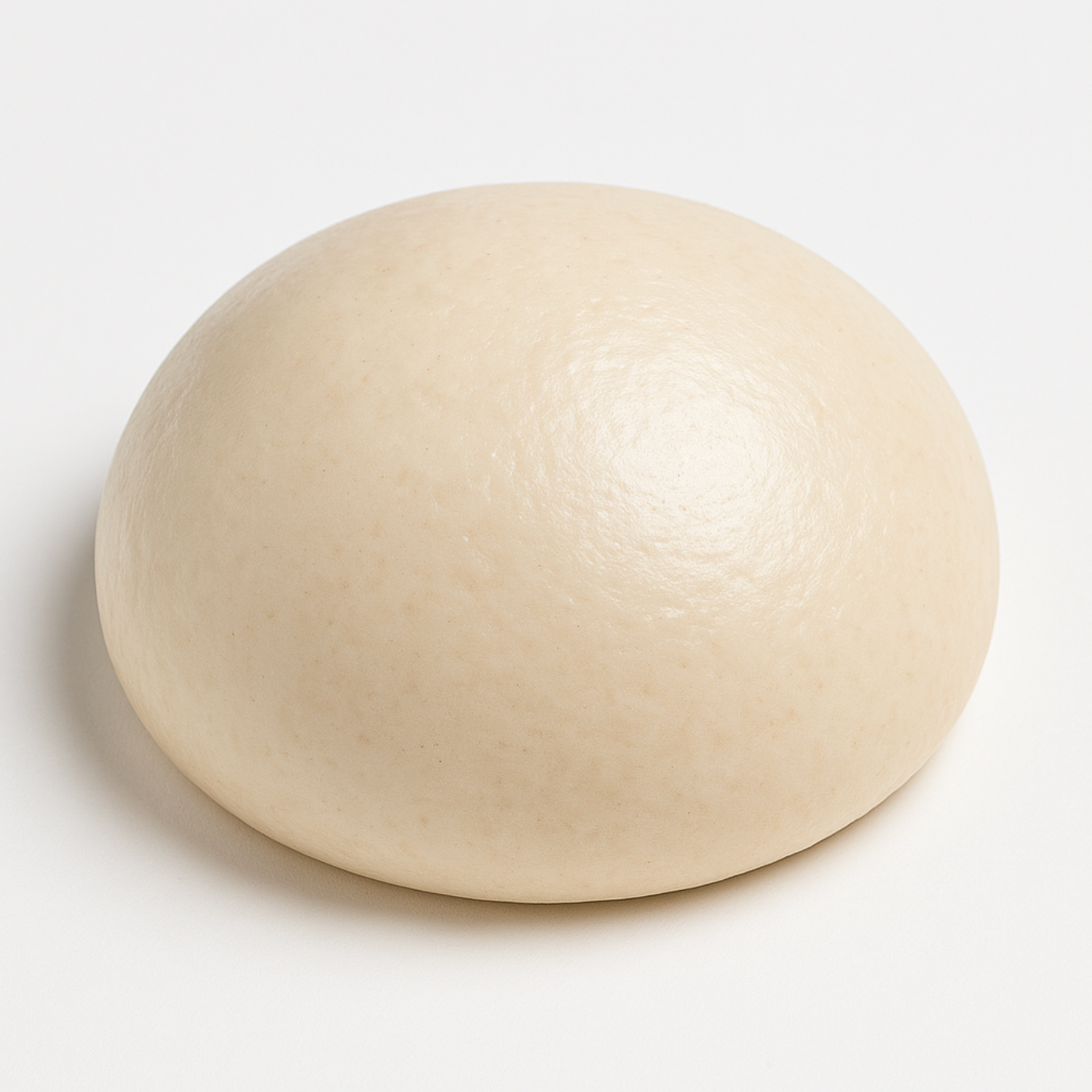 Round dough ball on a white background