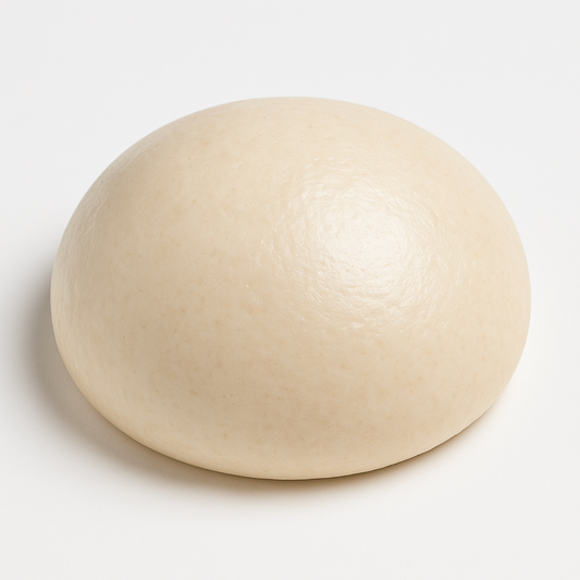 Round dough ball on a white background